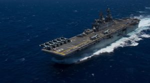 military defense aircraft carrier in the middle of the ocean